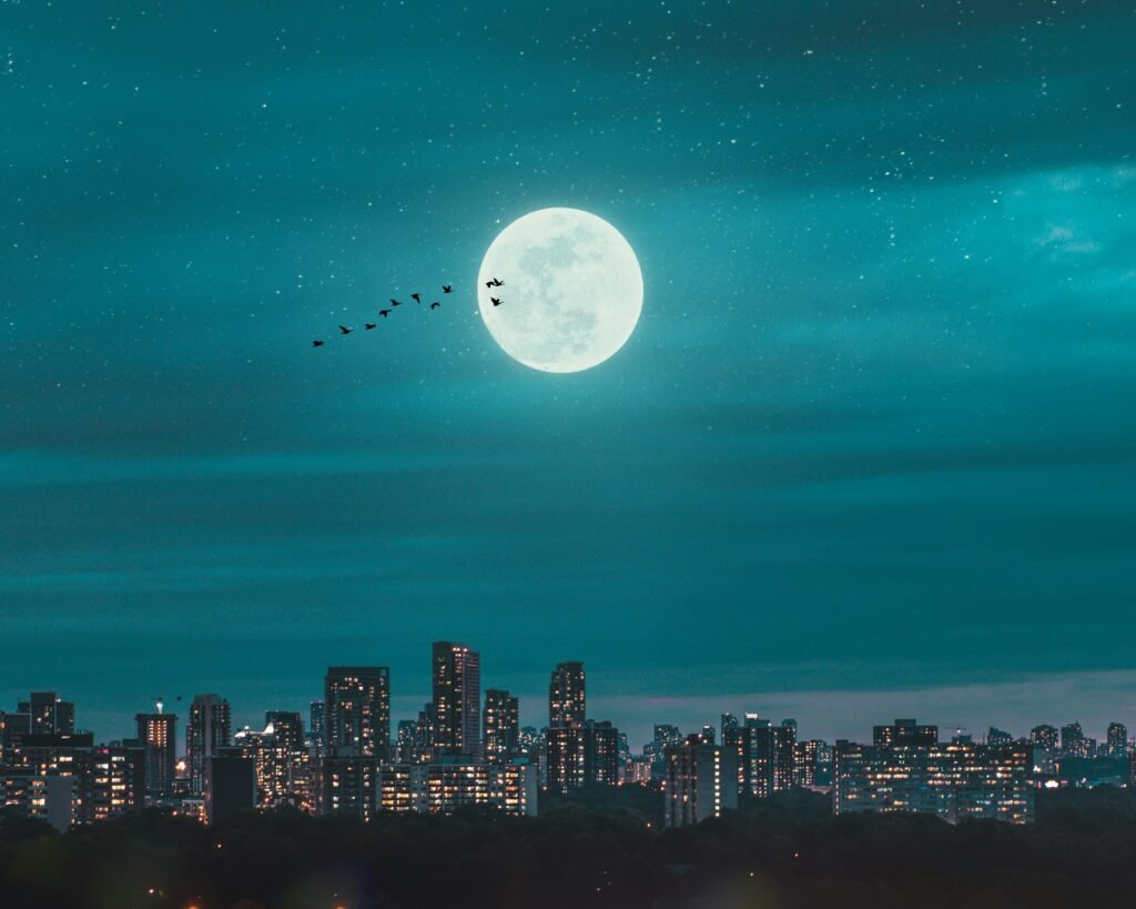 Supermoon visible above a city skyline in the United States in January 2026