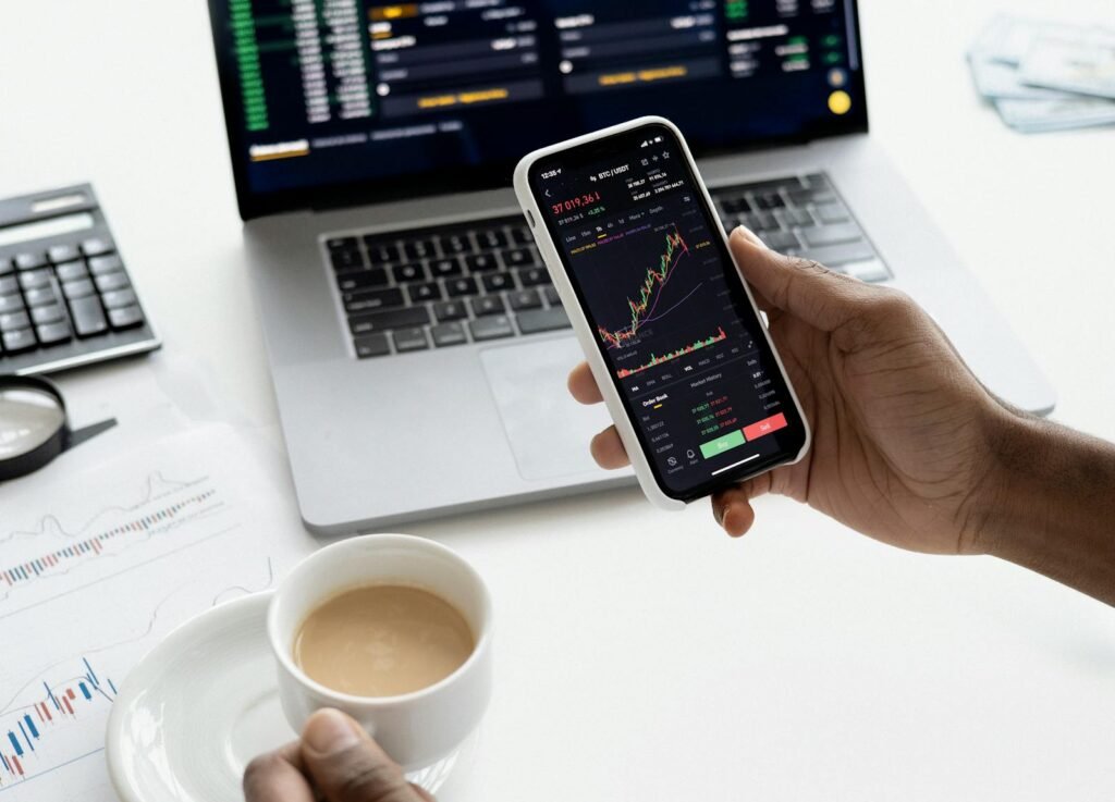 Stock market May 15 2026 Warsh Fed Chair trading laptop financial documents