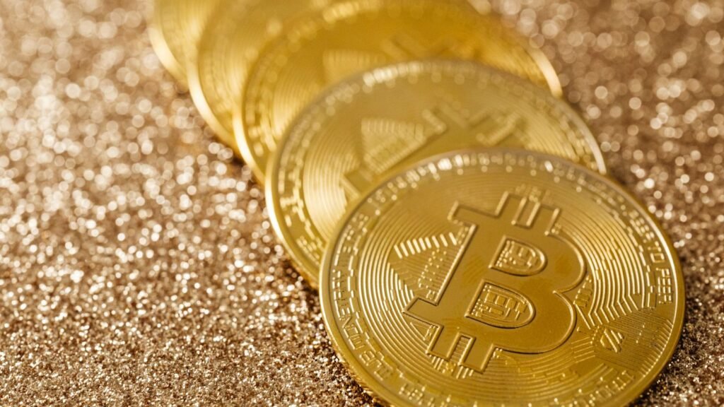 Gold cryptocurrency coins, illustrating the roughly $1 billion in Iranian crypto the US Treasury says it seized